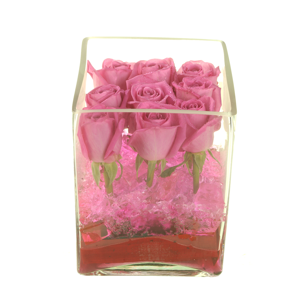 Γυάλα με ροζ τριαντάφυλλα