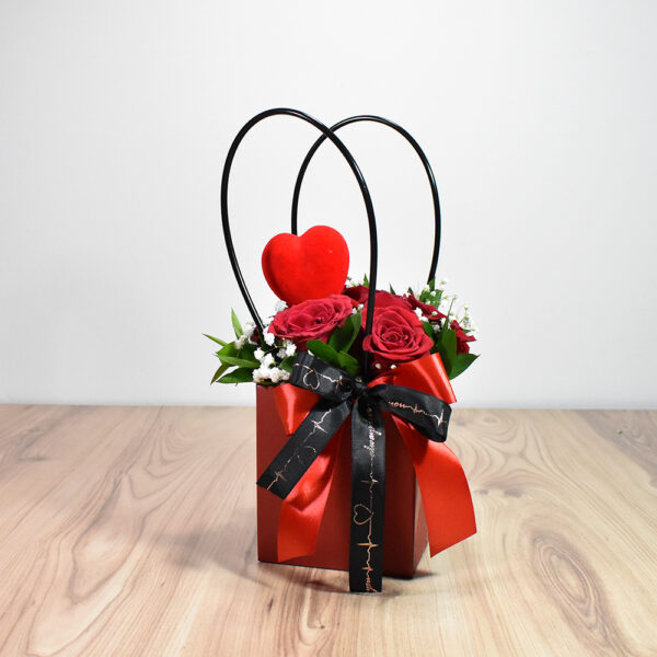 Black bag with red roses